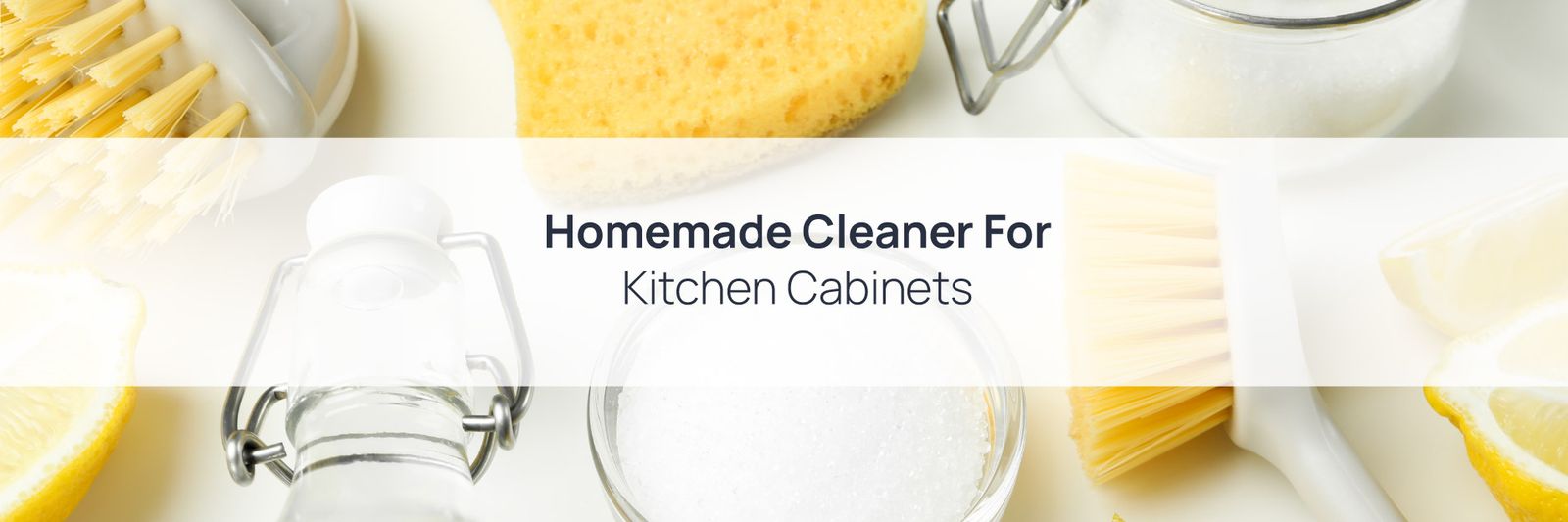 Homemade cleaner for kitchen cabinets on a countertop in a Calgary kitchen, surrounded by natural cleaning ingredients.