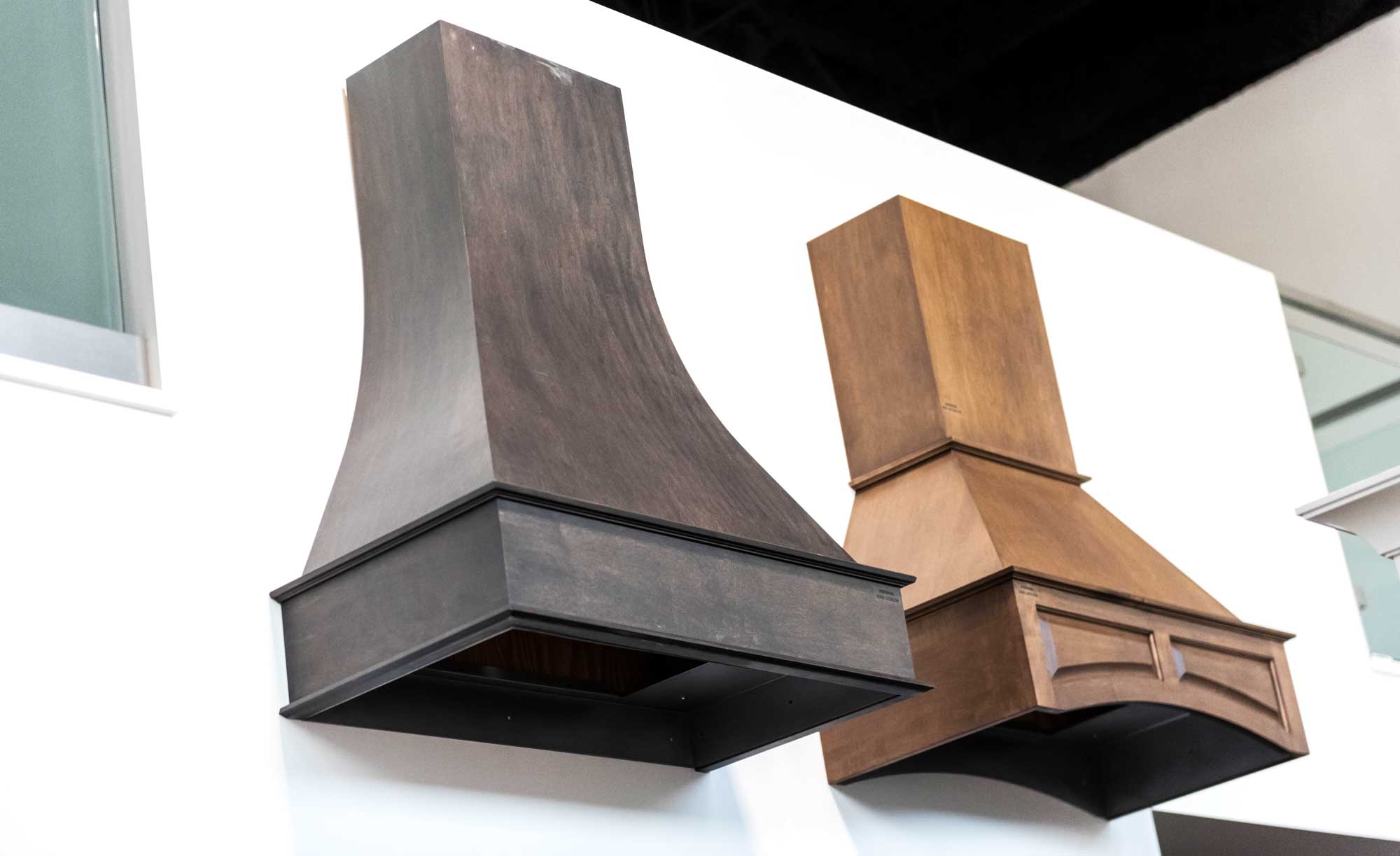 Custom range hood cover enhancing a modern kitchen design in Calgary, showcasing elegance and functionality.