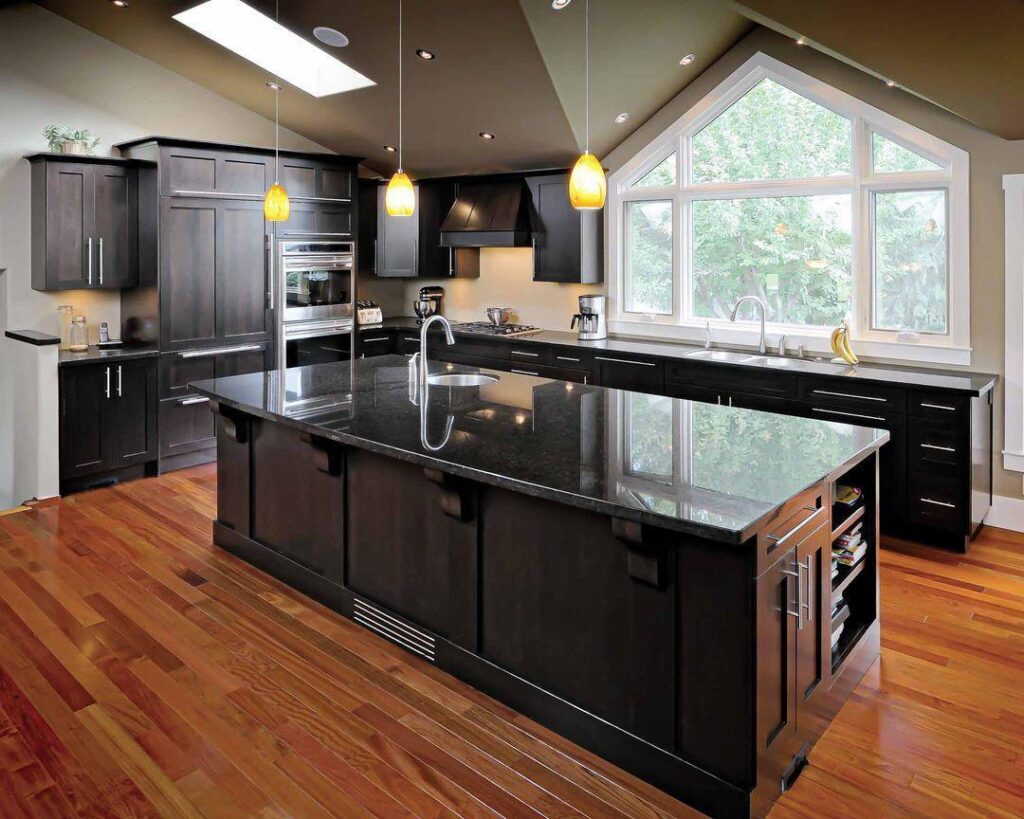 Modern kitchen with dark cabinetry.