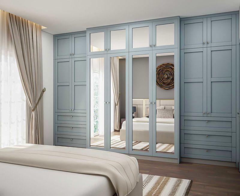Elegant blue wardrobe with mirrors.