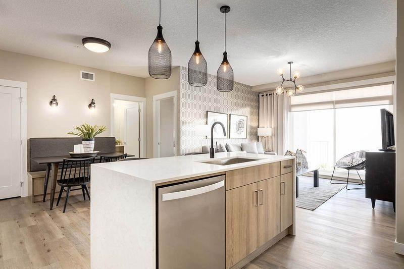 How to Choose the Best Open-Concept Cabinet Layout 5 Chic kitchen with cozy dining area.