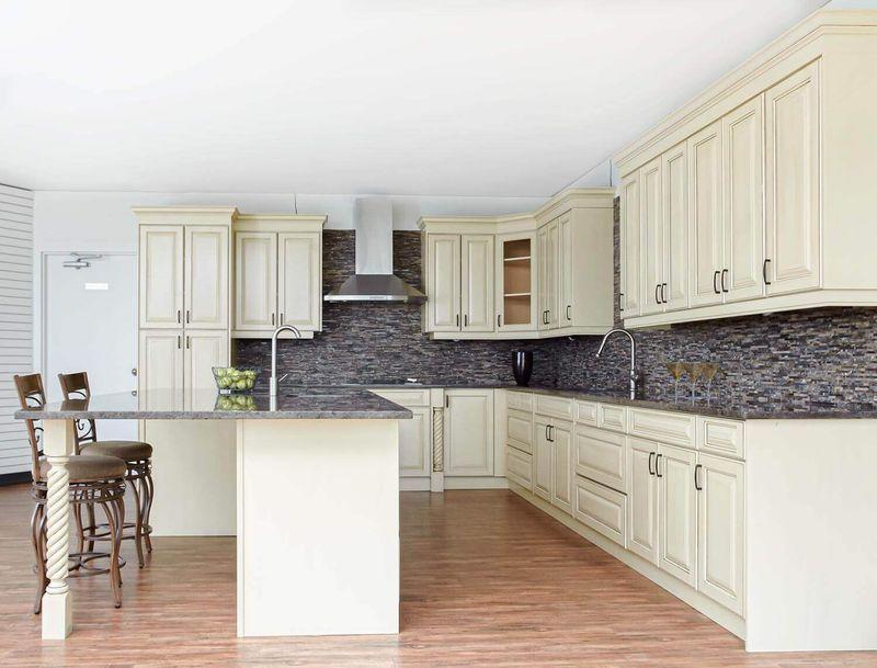 Elegant kitchen with light-colored cabinetry.
