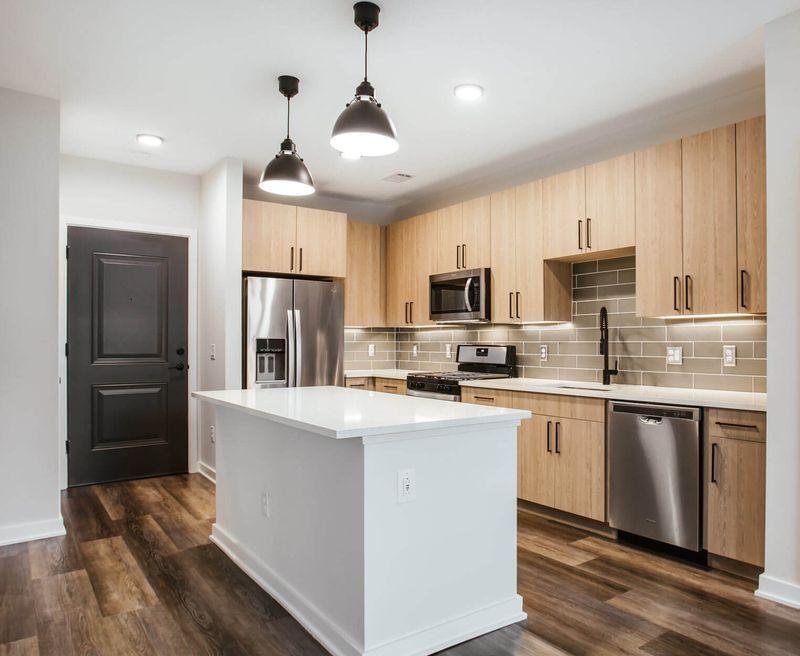 How to Finance a Kitchen Remodel: Smart Budgeting & Payment Planning 3 Stylish kitchen with wooden cabinetry.