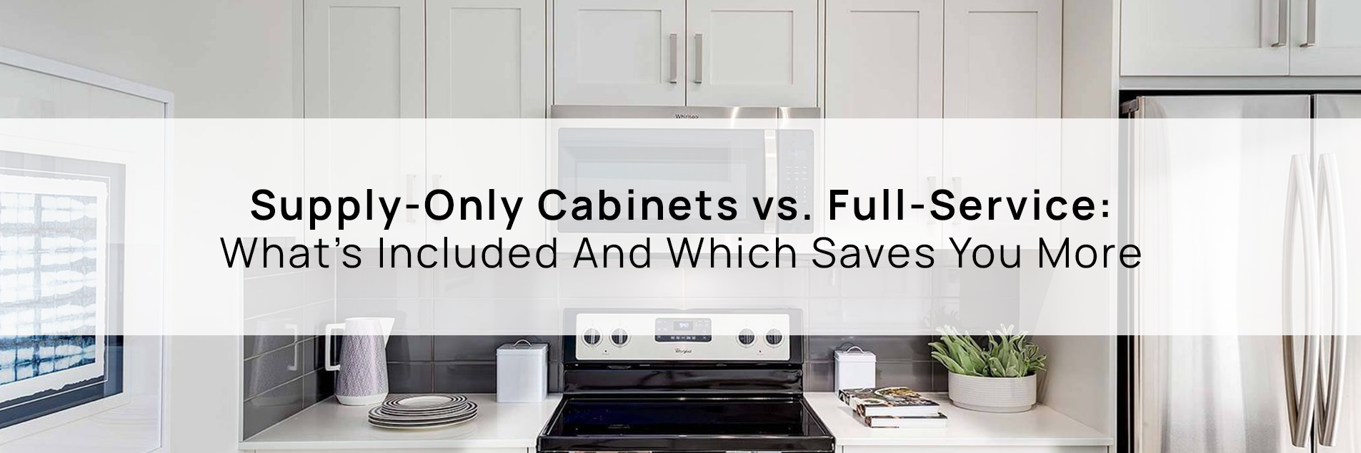 Modern kitchen with white Shaker-style cabinets and stainless steel appliances, highlighting the professional finish debated in supply-only cabinets vs full-service kitchen renovations.