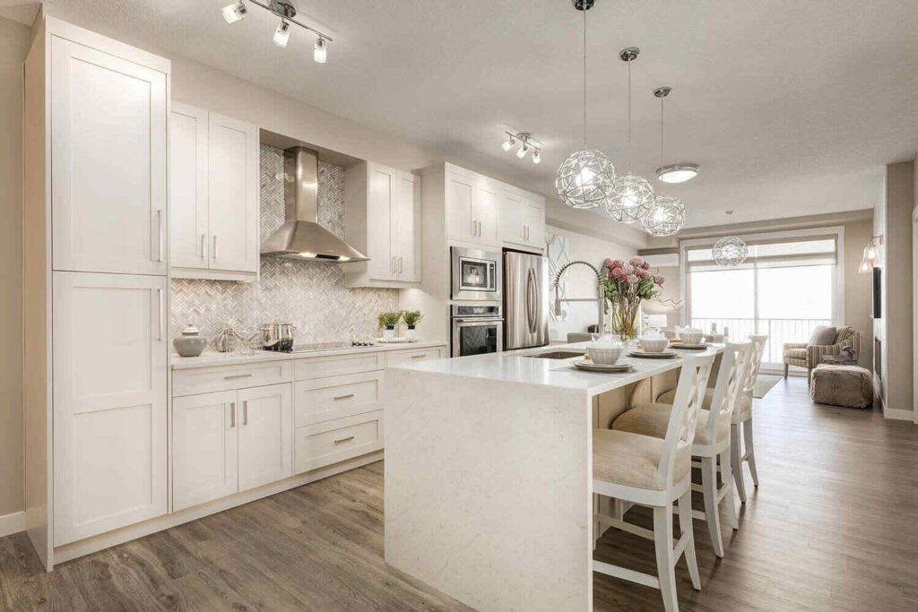 Kitchen with white cabinetry designed to follow cabinet depth standards, showing upper and lower cabinets aligned for efficient storage, workspace, and appliance clearance.