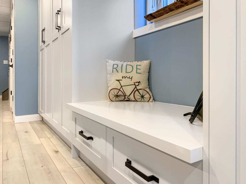 Mudroom Cabinets Ideas That Improve Everyday Organization 1 Built-in mudroom cubbies with bench seating and storage drawers for organized everyday entryway use.