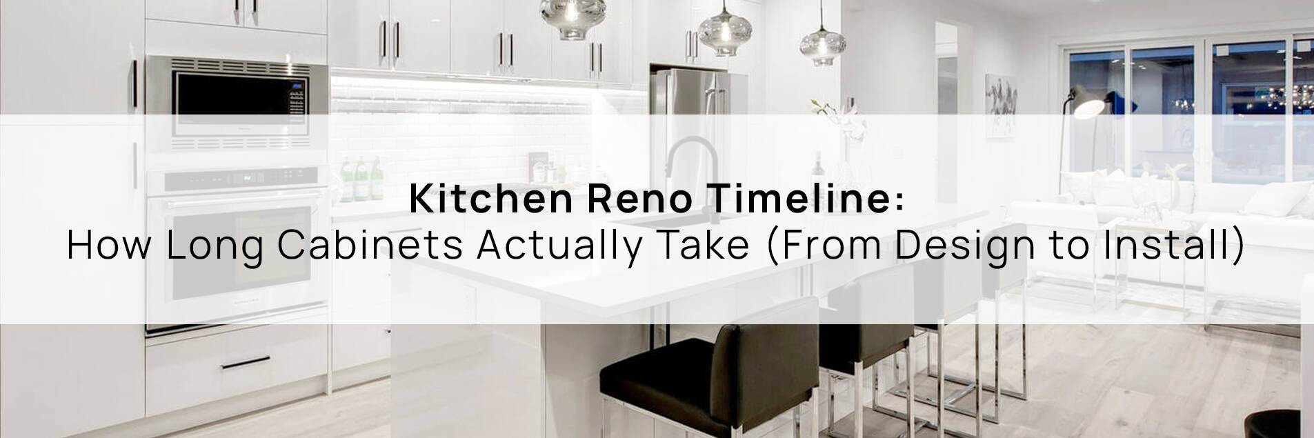 Modern white kitchen with island seating and pendant lighting, illustrating the timeline of kitchen renovations and how long cabinet installation takes.